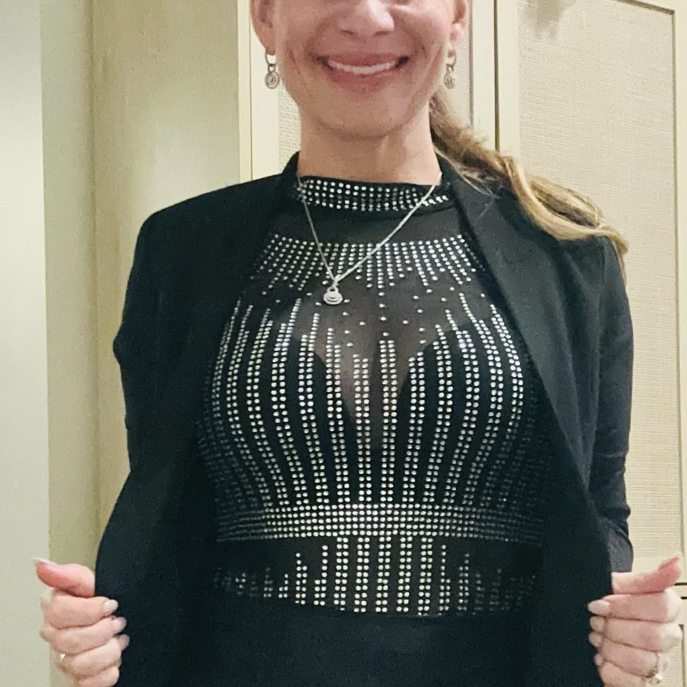 Rhinestone body suit.  It’s a beauty